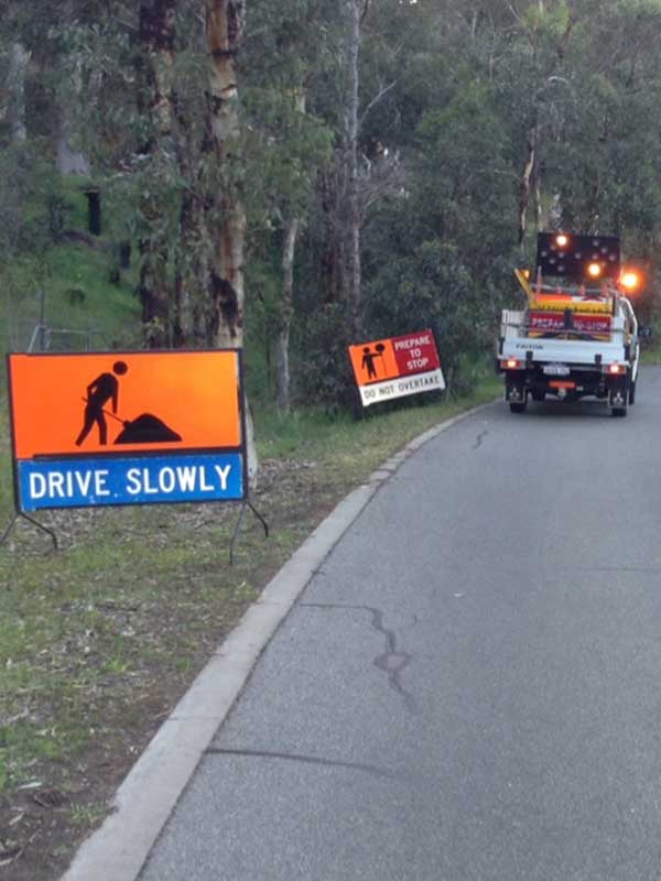 Work Crew setting up road signs